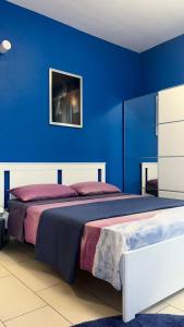 Ένα ή περισσότερα κρεβάτια σε δωμάτιο στο Bologna-Apartments