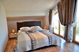 Postel nebo postele na pokoji v ubytování Villa Amalia Apartments