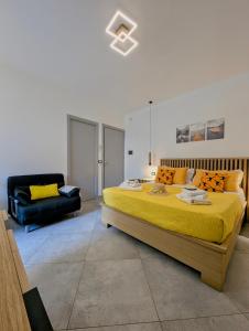 Postel nebo postele na pokoji v ubytování I colori della Sicilia