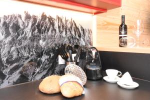 Zestaw do parzenia kawy i herbaty w obiekcie Luxusapartment Müllerhaus