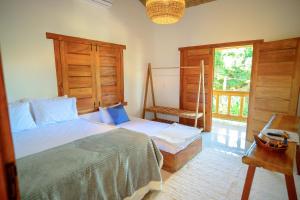 En eller flere senge i et værelse på Villa Beija Flor + 66 billeder