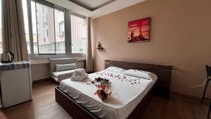 Postel nebo postele na pokoji v ubytování Vespucci Rooms