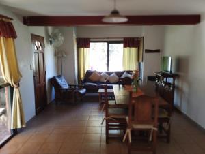 Posezení v ubytování AMALGAMA CABAÑAS