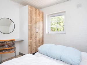 Postel nebo postele na pokoji v ubytování Luxury Thatched Retreat - By Traum Ferienwohnungen
