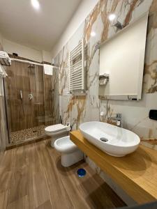 Koupelna v ubytování Hotel Barbato