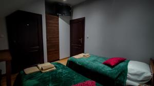 Postel nebo postele na pokoji v ubytování Hotel von Donnersmarck