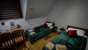 Postel nebo postele na pokoji v ubytování Hotel von Donnersmarck