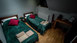 Postel nebo postele na pokoji v ubytování Hotel von Donnersmarck