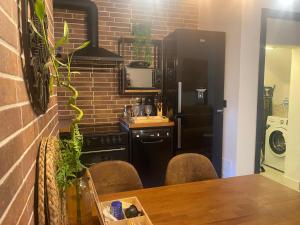 A kitchen or kitchenette at Beach and Sun - Paseo Marítimo -Playa
