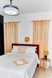 Letto o letti in una camera di Serene Beach Apartment