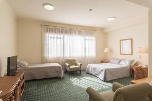 Mary MacKillop Spirituality Centre Baulkham Hills客房内的一张或多张床位