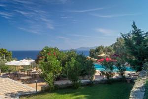 a view of the pool at a resort at Armonia Bay Hotel in Kokkari