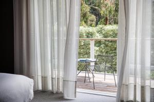 Lancemore Lindenderry Red Hill客房内的一张或多张床位