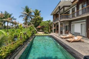 Πισίνα στο ή κοντά στο Family Paradise Villa, Shared Pool, Jungle & Rice Field Views