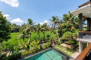 Πισίνα στο ή κοντά στο Family Paradise Villa, Shared Pool, Jungle & Rice Field Views