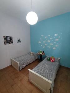 Postel nebo postele na pokoji v ubytování Casa a pocas cuadras del centro
