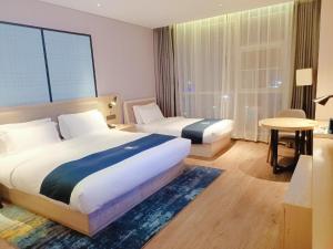 Foto sihtkohas Huangxing asuva majutusasutuse Echarm Hotel Changsha Huangxing Avenue Airport Store galeriist