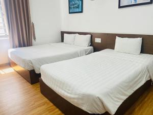 Postel nebo postele na pokoji v ubytování Silana Beachfront Hotel & Spa