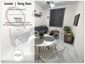 a living room with a table and chairs at Loft Joe con WiFi y Alberca in Tulum