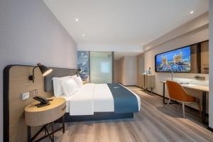Foto dalla galleria di Echarm Hotel Changsha High Speed Rail South Station Wujiang Tianjie Branch a Changsha