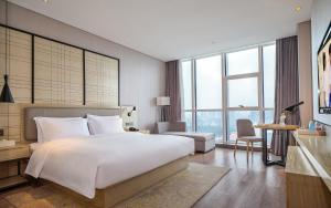 Fotografie z fotogalerie ubytování Echarm Hotel Changsha Window of the World Radio and Television Convention and Exhibition Center Branch v destinaci Xingsha