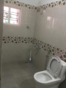Koupelna v ubytování Shilpa Vikas Homestay