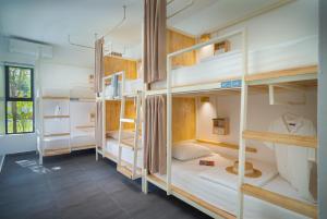 a room with a bunch of bunk beds at Onederz Siem Reap in Siem Reap