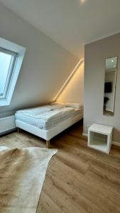 Katil atau katil-katil dalam bilik di Stylisches Studio nahe Messe & Baldeneysee - Ruhig & perfekt angebunden