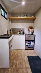 Η κουζίνα ή μικρή κουζίνα στο El Nido Lofts