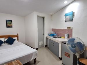 Postel nebo postele na pokoji v ubytování Casa Oeste