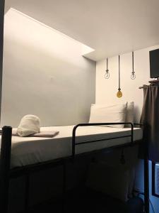 Letto o letti in una camera di The Pocket Hotel