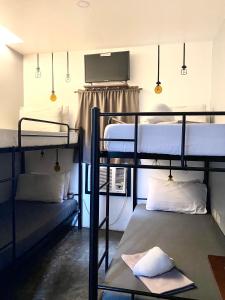 Letto o letti in una camera di The Pocket Hotel