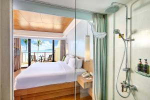 Ein Bett oder Betten in einem Zimmer der Unterkunft Beyond Karon