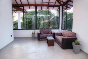 Posezení v ubytování COCO VIEW Guest House + 18 fotografií