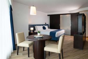 Postel nebo postele na pokoji v ubytování Wyndham Guayaquil, Puerto Santa Ana