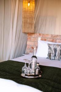 Een bed of bedden in een kamer bij Lodge Damaraland