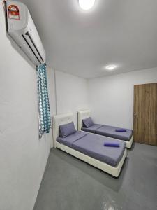 Postel nebo postele na pokoji v ubytování SS TWO Hostel Penang