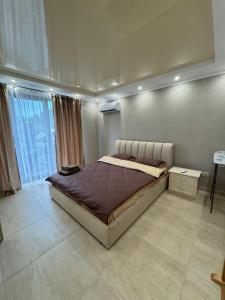 Postel nebo postele na pokoji v ubytování Guest Apart Polyana