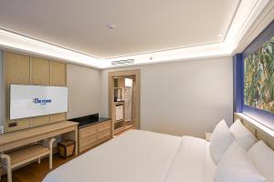 Ein Bett oder Betten in einem Zimmer der Unterkunft Beyond Kata