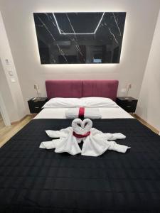 Krevet ili kreveti u jedinici u okviru objekta Raffaelli Suite