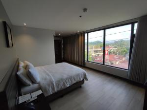 Postel nebo postele na pokoji v ubytování Hotel Inigo + 28 fotografií