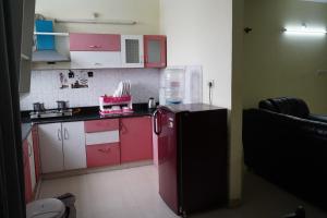 Η κουζίνα ή μικρή κουζίνα στο Golden Bells