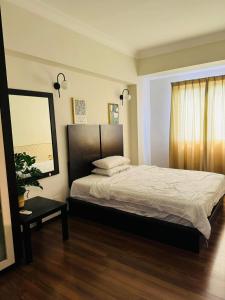 Katil atau katil-katil dalam bilik di Homestay Room near KLCC