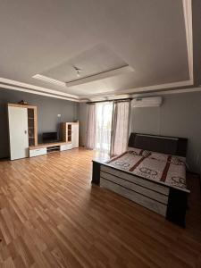 Postel nebo postele na pokoji v ubytování GuestHouse
