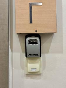 a maserati meter is attached to a wall at Downtown Studio A1Γ in Komotini