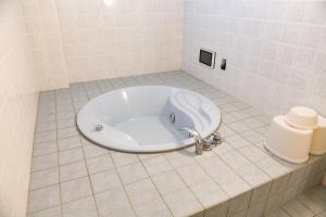 Koupelna v ubytování Hotel HERB ホテルハーブ大人用
