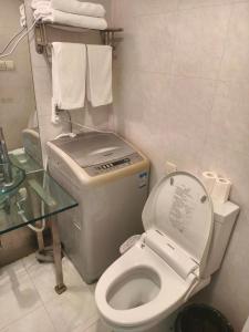 Koupelna v ubytování 上海加特奈斯新时空酒店中山公园店