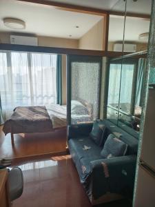 Postel nebo postele na pokoji v ubytování 上海加特奈斯新时空酒店中山公园店
