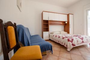 Postel nebo postele na pokoji v ubytování Apartments Mili + 37 fotografií