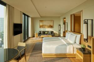 TV a/nebo společenská místnost v ubytování Hotel Tentrem Jakarta